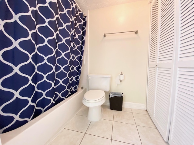 10555 Turtlewood Ct Unit 2102, Houston, TX 77072 - full bath with toilet, tile patterned floors, shower / bath combo, and baseboards