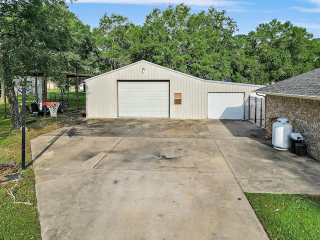 detached garage with fence