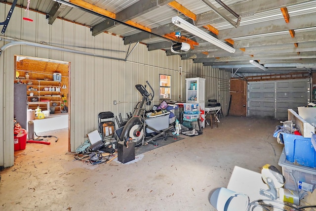 garage featuring a garage door opener