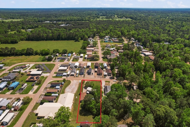 aerial view featuring a residential view and a forest view