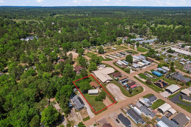 aerial view featuring a view of trees