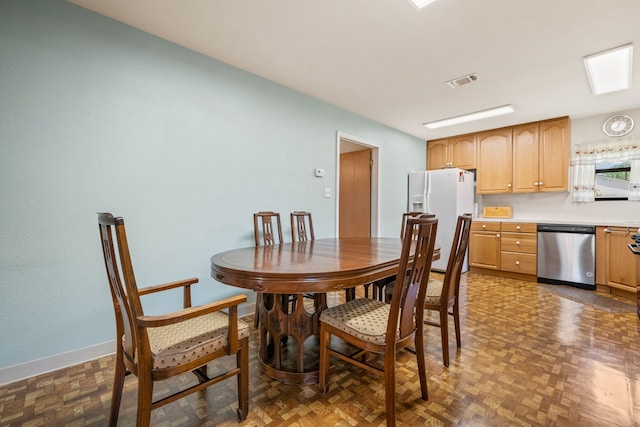 dining space with visible vents