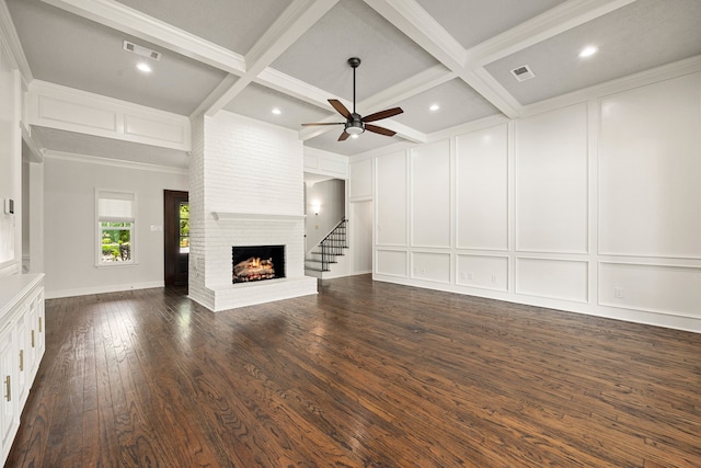 5511 Oak Cove Dr, Kingwood, TX 77345 - unfurnished living room with beamed ceiling, a ceiling fan, visible vents, and a decorative wall