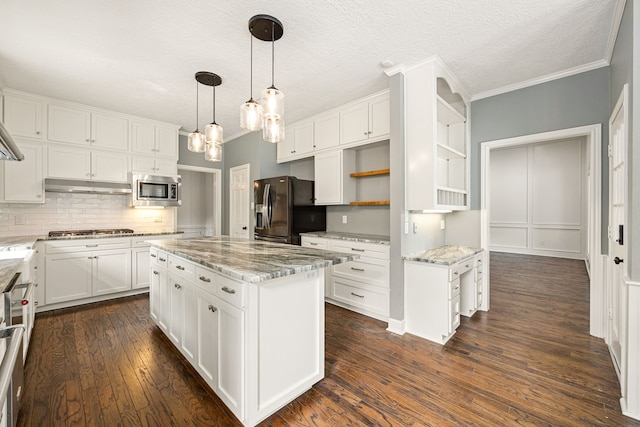 5511 Oak Cove Dr, Kingwood, TX 77345 - kitchen with open shelves, appliances with stainless steel finishes, white cabinets, backsplash, and under cabinet range hood