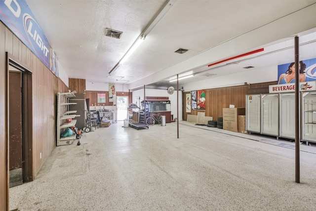 7846 Dayton St, Houston, TX 77012 - garage with wooden walls and visible vents