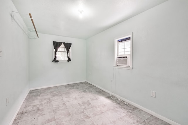 7846 Dayton St, Houston, TX 77012 - unfurnished room featuring baseboards and plenty of natural light