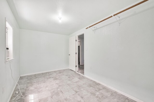 7846 Dayton St, Houston, TX 77012 - spare room with baseboards