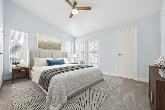 bedroom with lofted ceiling, baseboards, a ceiling fan, and carpet flooring