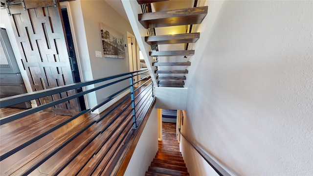 12500 Melville Dr Unit 211, Montgomery, TX 77356 - stairway with wood finished floors