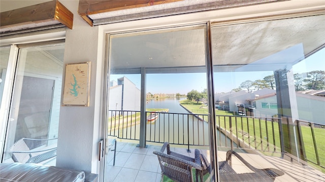 12500 Melville Dr Unit 211, Montgomery, TX 77356 - sunroom featuring a water view and plenty of natural light