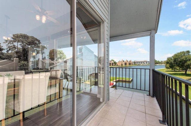 12500 Melville Dr Unit 211, Montgomery, TX 77356 - balcony featuring a water view and a ceiling fan