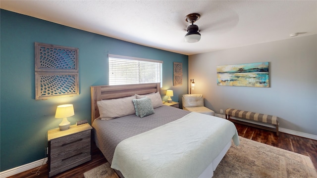 12500 Melville Dr Unit 211, Montgomery, TX 77356 - bedroom featuring wood finished floors and a ceiling fan