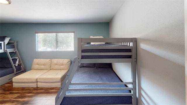 12500 Melville Dr Unit 211, Montgomery, TX 77356 - bedroom with wood finished floors