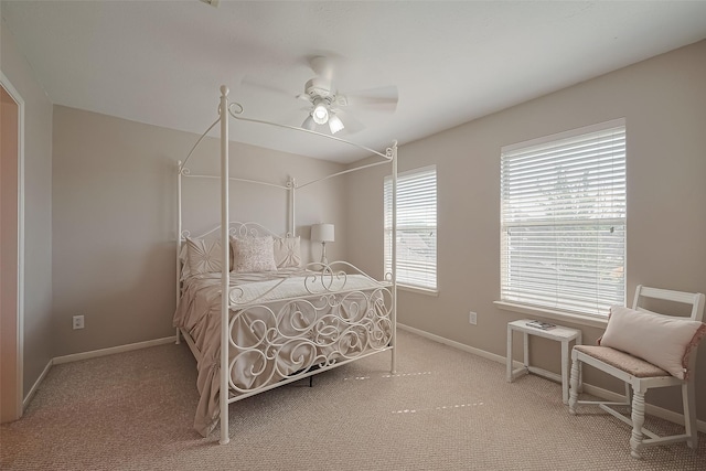 bedroom with baseboards, a ceiling fan, and carpet floors