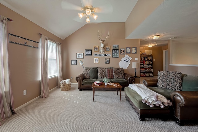 living room with light carpet, baseboards, vaulted ceiling, and ceiling fan
