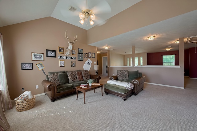 living area with visible vents, ceiling fan, baseboards, and carpet