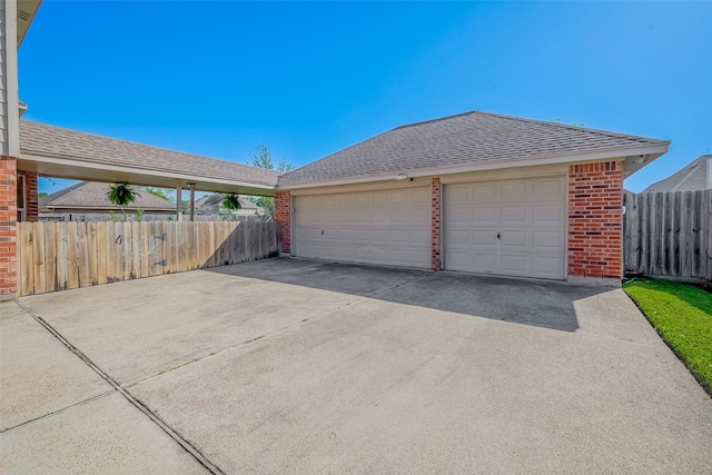 detached garage with fence