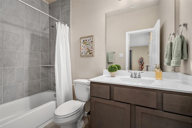 full bathroom featuring shower / tub combo, toilet, and vanity