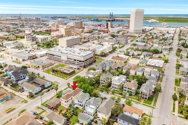 drone / aerial view featuring a water view and a city view