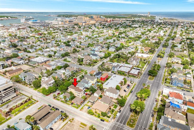 birds eye view of property featuring a water view and a residential view