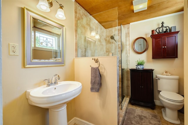 full bath with toilet, walk in shower, and baseboards