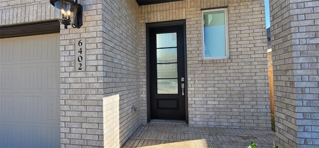 5823 Starling Dr, Baytown, TX 77521 - property entrance featuring brick siding