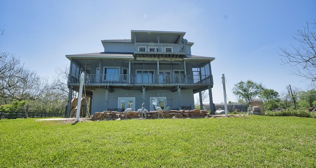 3054 Fm 2611th Rd, Brazoria, TX 77422 - back of house featuring stairway and a balcony