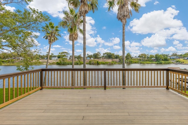 deck featuring a water view