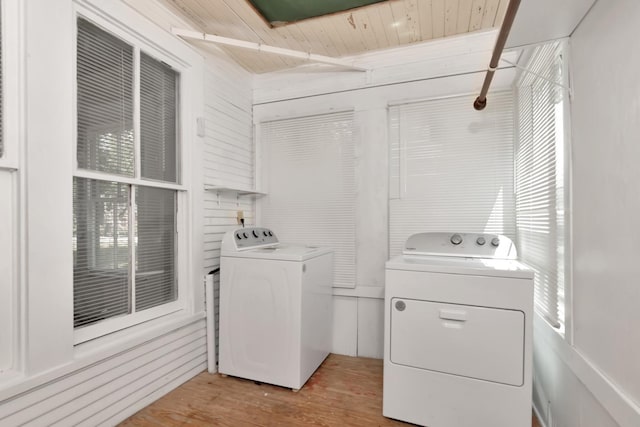 428 E Magnolia St, Angleton, TX 77515 - laundry room featuring light wood-style floors, separate washer and dryer, laundry area, and wooden ceiling