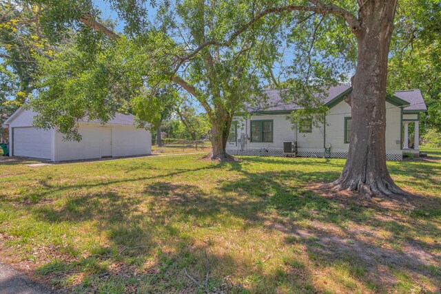 428 E Magnolia St, Angleton, TX 77515 - view of yard featuring an outbuilding