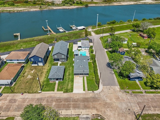 602 W 1st St, Freeport, TX 77541 - aerial perspective of suburban area featuring a large body of water