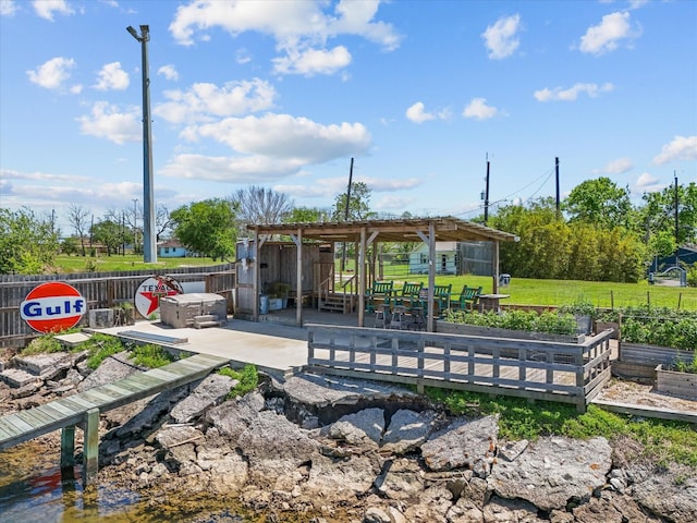 602 W 1st St, Freeport, TX 77541 - view of home's community with a garden