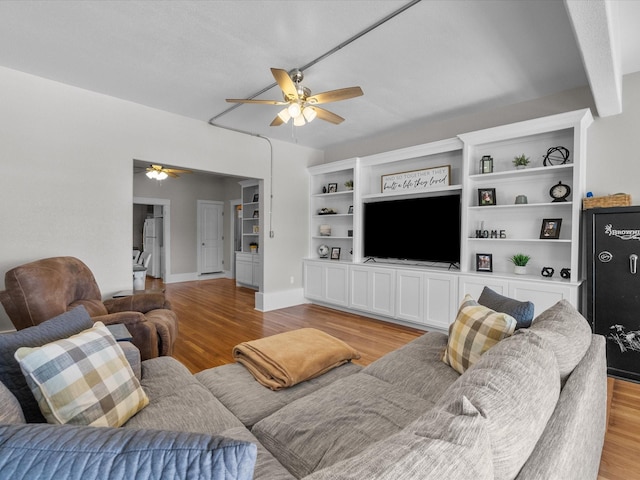 602 W 1st St, Freeport, TX 77541 - living room featuring ceiling fan and light wood-style flooring