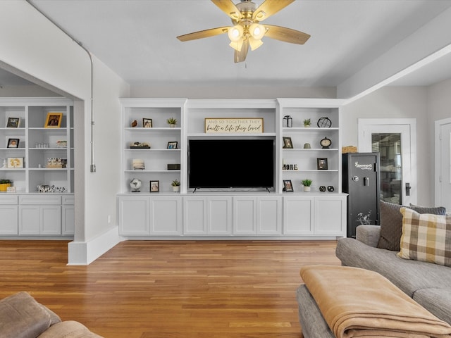 602 W 1st St, Freeport, TX 77541 - living area featuring ceiling fan and light wood finished floors