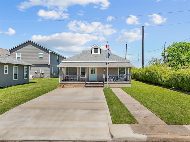 602 W 1st St, Freeport, TX 77541 - bungalow-style house with covered porch, concrete driveway, a front yard, and a shingled roof