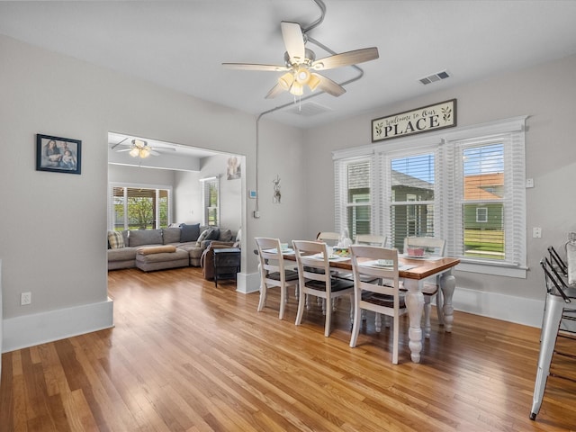 602 W 1st St, Freeport, TX 77541 - dining room featuring a ceiling fan and light wood-style flooring