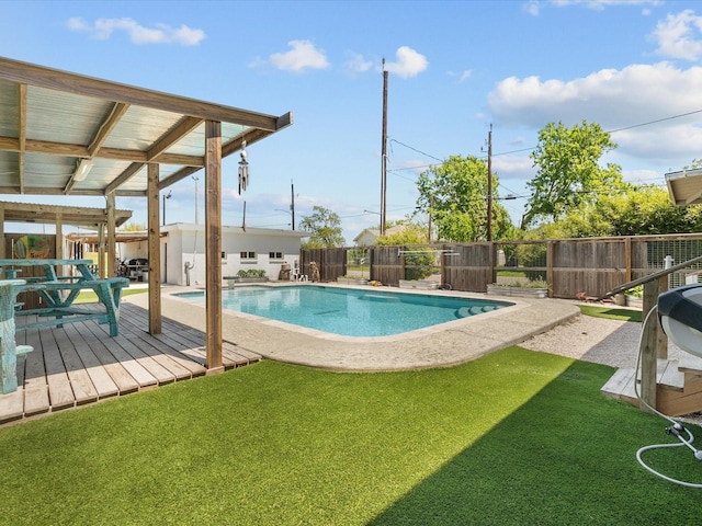 602 W 1st St, Freeport, TX 77541 - view of pool featuring a fenced backyard and a wooden deck