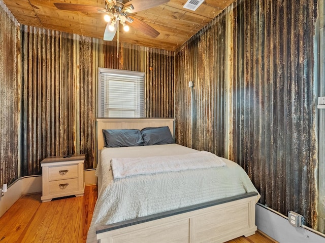 602 W 1st St, Freeport, TX 77541 - bedroom with wooden ceiling, wood finished floors, and ceiling fan