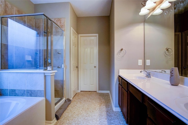full bath with a sink, tile patterned flooring, double vanity, a bath, and a stall shower