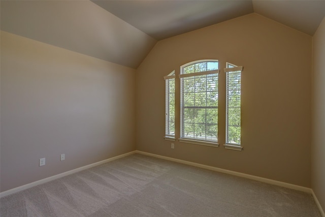 6103 Silver Thistle Ln, Fulshear, TX 77441 - unfurnished room with light carpet and vaulted ceiling