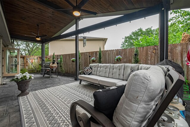 131 Breezy Shore Ct, Dickinson, TX 77539 - view of patio / terrace featuring area for grilling, a ceiling fan, an outdoor hangout area, and a fenced backyard