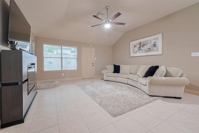 131 Breezy Shore Ct, Dickinson, TX 77539 - living area featuring light tile patterned flooring, visible vents, a ceiling fan, baseboards, and vaulted ceiling