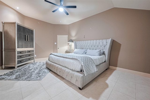 131 Breezy Shore Ct, Dickinson, TX 77539 - bedroom with baseboards, ceiling fan, light tile patterned floors, and vaulted ceiling