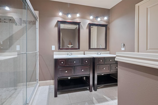 131 Breezy Shore Ct, Dickinson, TX 77539 - full bathroom with double vanity, a sink, tile patterned flooring, and a stall shower