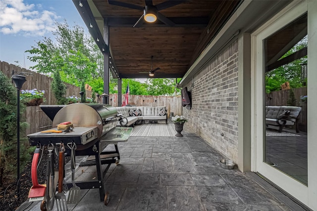 131 Breezy Shore Ct, Dickinson, TX 77539 - view of patio / terrace with a fenced backyard, ceiling fan, outdoor lounge area, and a grill