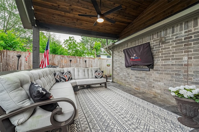 131 Breezy Shore Ct, Dickinson, TX 77539 - view of patio / terrace featuring an outdoor hangout area, ceiling fan, and a fenced backyard