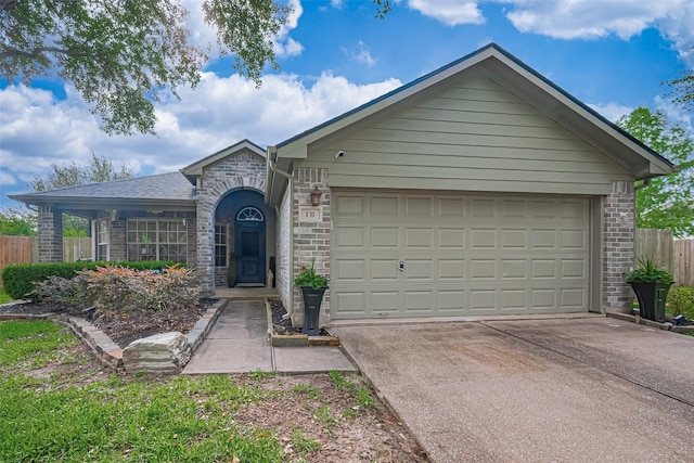 131 Breezy Shore Ct, Dickinson, TX 77539 - single story home featuring fence, an attached garage, concrete driveway, and brick siding