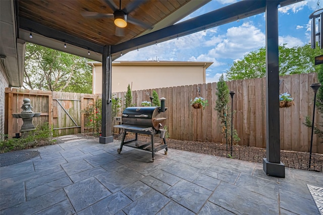 131 Breezy Shore Ct, Dickinson, TX 77539 - view of patio / terrace featuring ceiling fan, a fenced backyard, and a grill