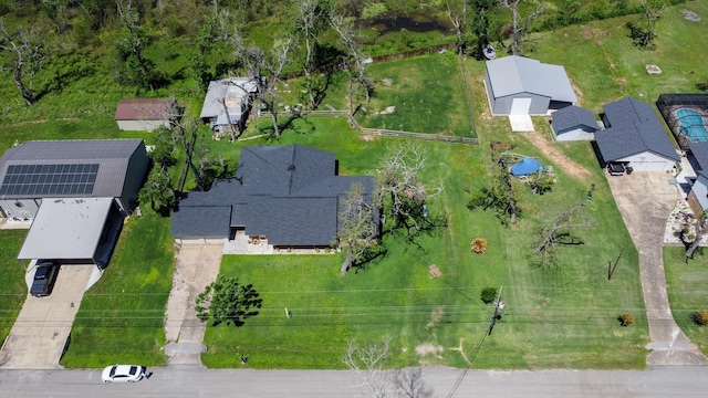 birds eye view of property with a residential view