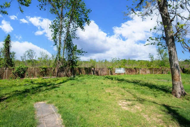 view of yard with fence